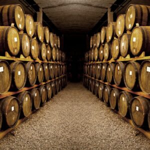 Multiple barrels on wine on the wall. 